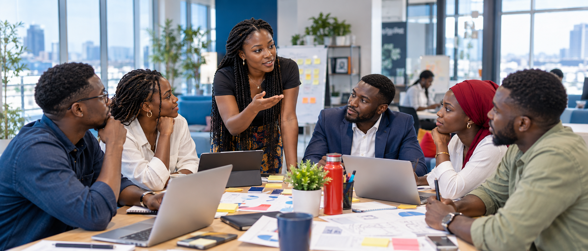 Young SWIF members and partners collaborating in a workspace
